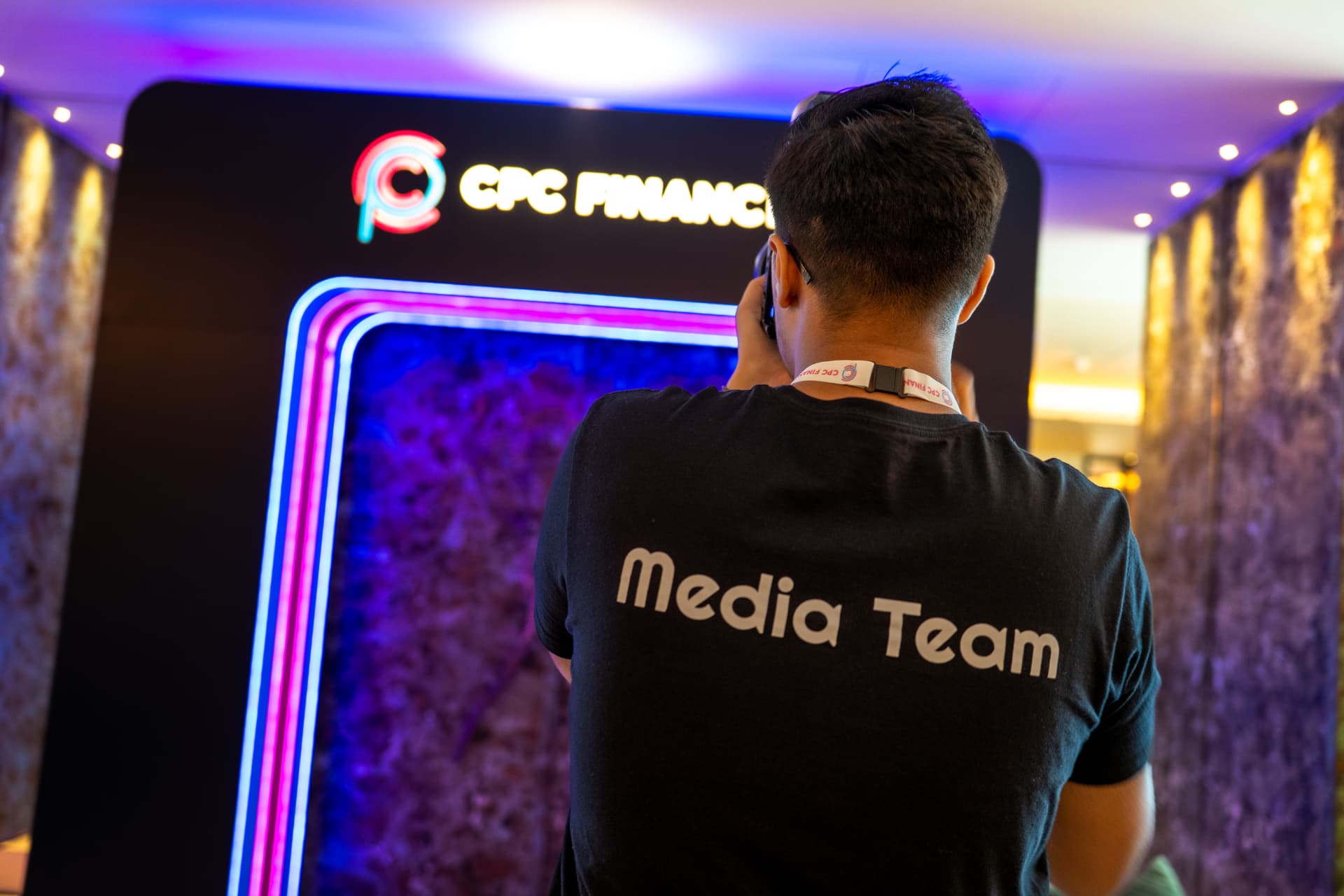 Seven Media team member filming at a CPC Finance event